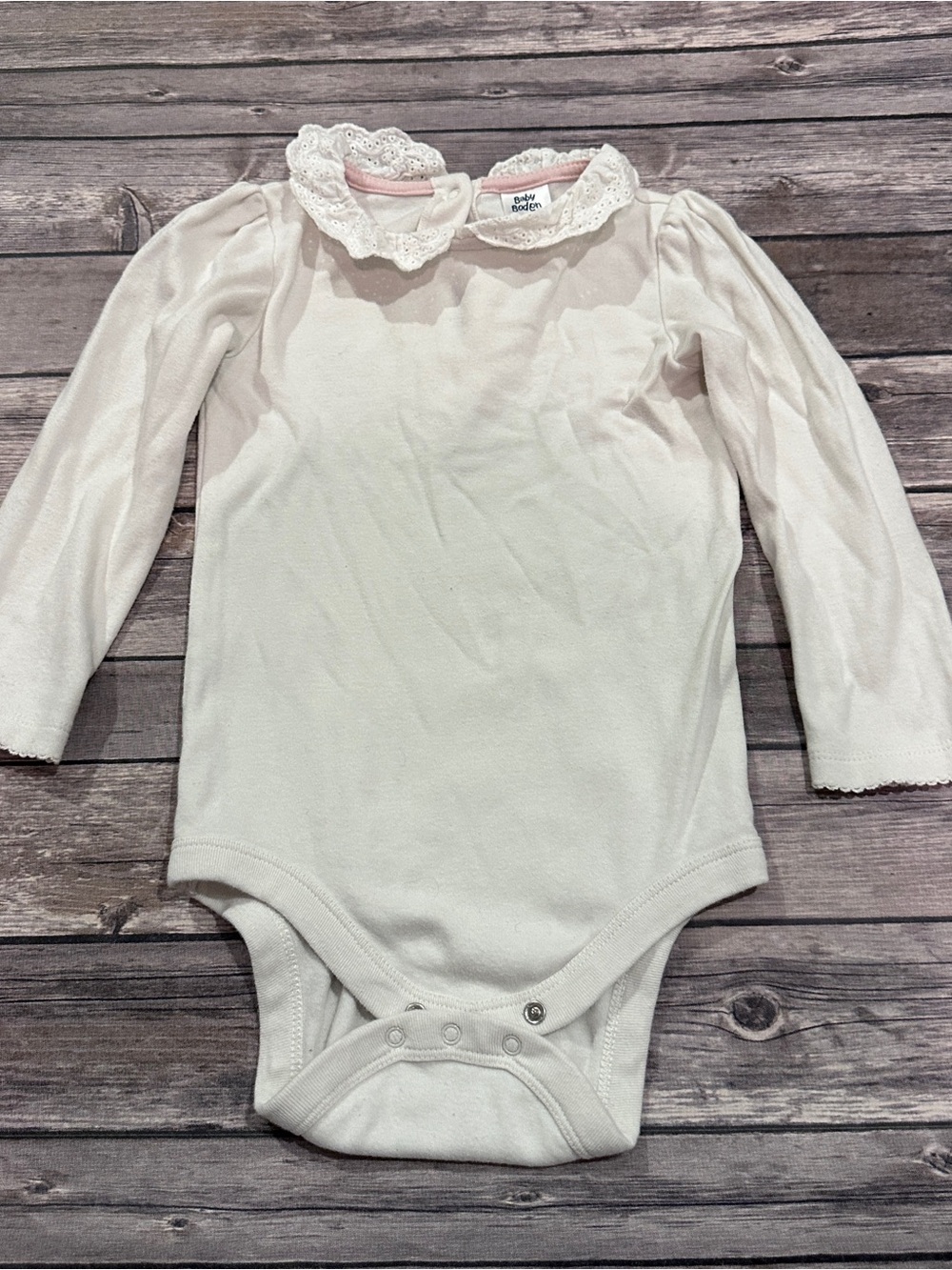 Baby Boden white onesie with lace collar fair light stains, size 2-3 years